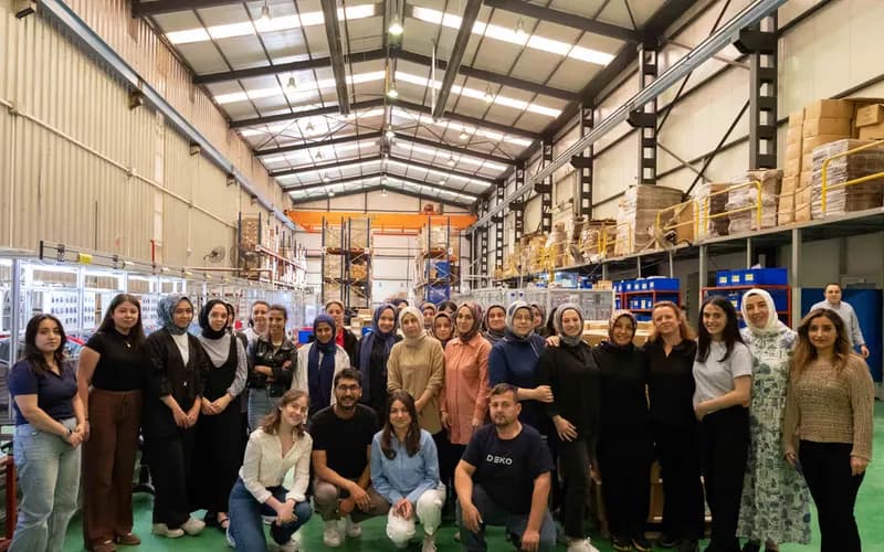 EIG team with DEKO factory employees during an AI upskilling session